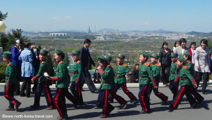 Children at the Revolutionary Martyr's Cemetery in the outskirts of Pyongyang, capital of North Korea