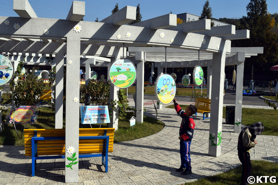 Sign explaining to kids the consequences of CO2 emissions at the Pyongyang Children's Traffic Park, North Korea (DPRK)