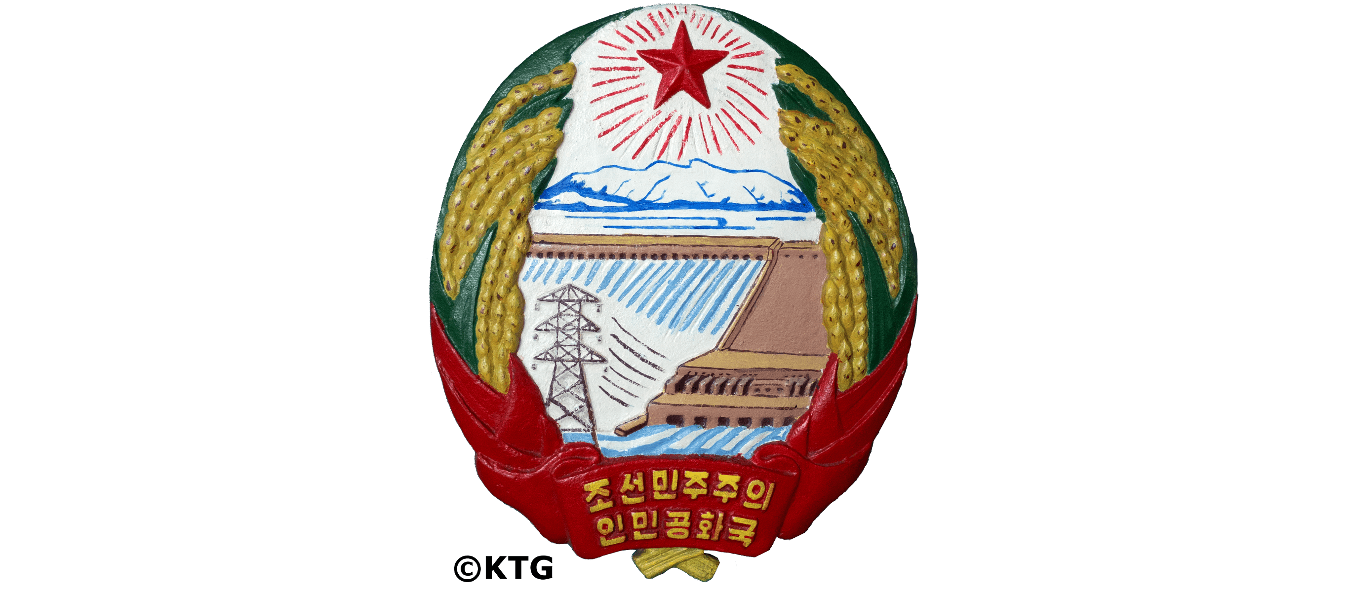 DPRK Natonional Emblem. The National Emblem of North Korea consists of a red star, Mount Paekdu, a dam, electric towers and cornfields. Picture taken by KTG