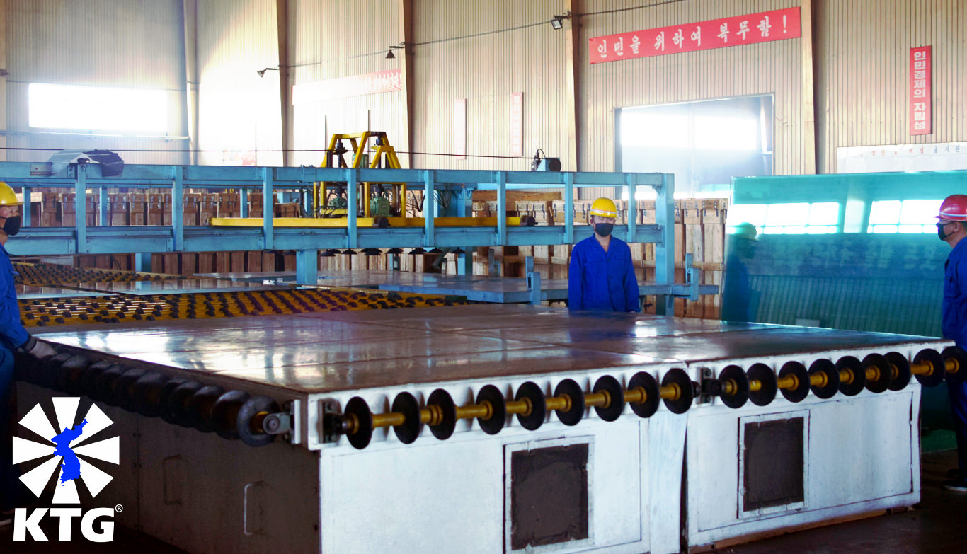 Heavy industry in North Korea; workers at the Taen Friendship Glass Manufacturing Factory near Nampo city. Trip arranged by KTG Tours