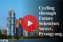 Cycling through Mirae street in Pyongyang with KTG Tours