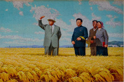 Mosaic picture of Leaders Kim Il Sung and Kim Jong Il and Chonsam cooperative farm near Wonsan in North Korea, DPRK, with KTG Tours