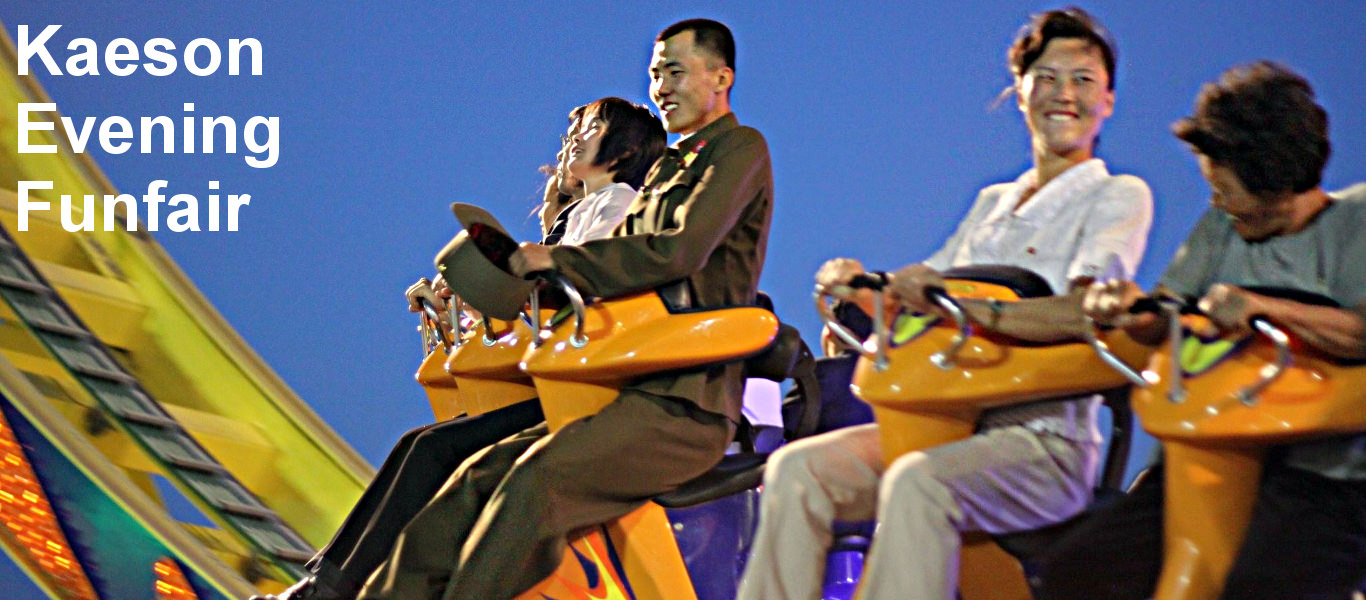 North Korean soldier enjoys a ride at the Kaeson Amusement Park in Pyongyang, North Korea