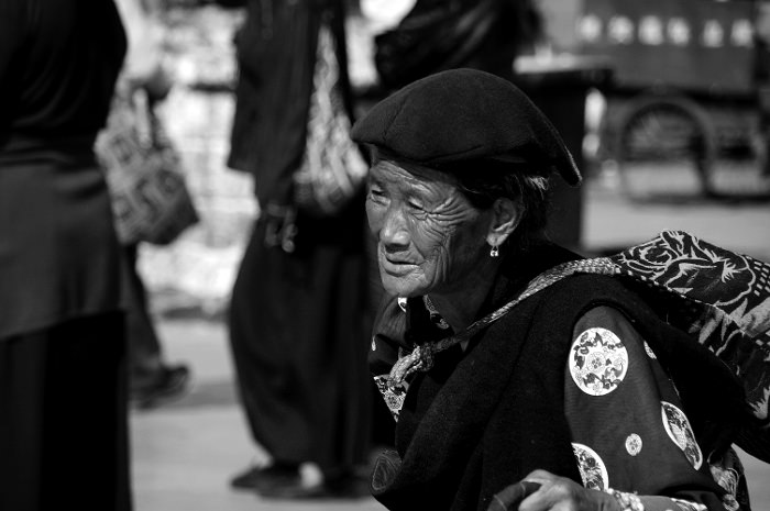 Pilgrims praying at Jokhang Temple in Lhasa, Tibet, China