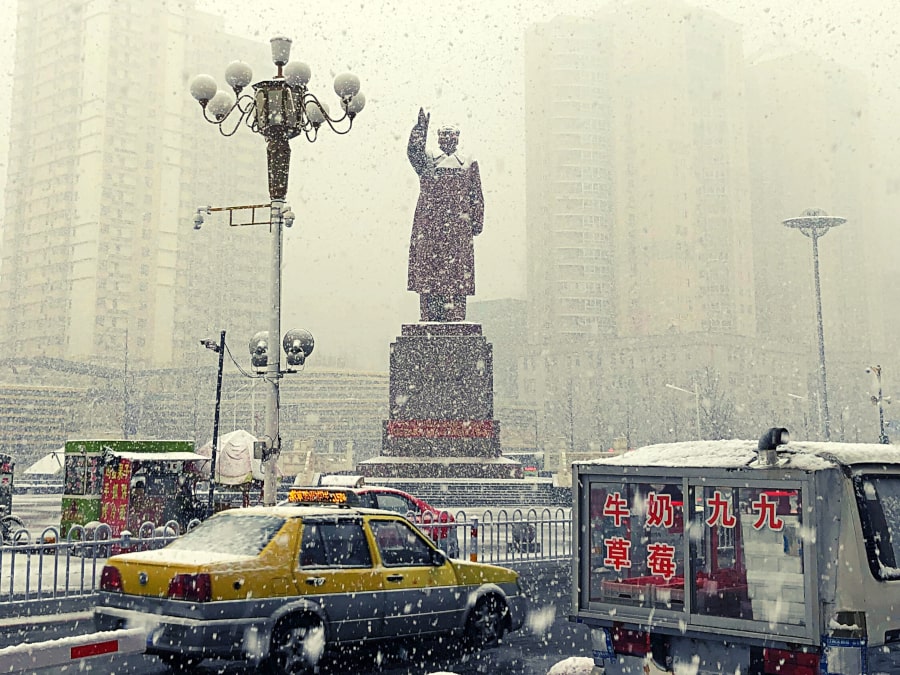 Statue of Chairman Mao Zaodong in Dandong city, Liaoning province in China, boder city with North Korea (DPRK). Tour arranged by KTG Tours