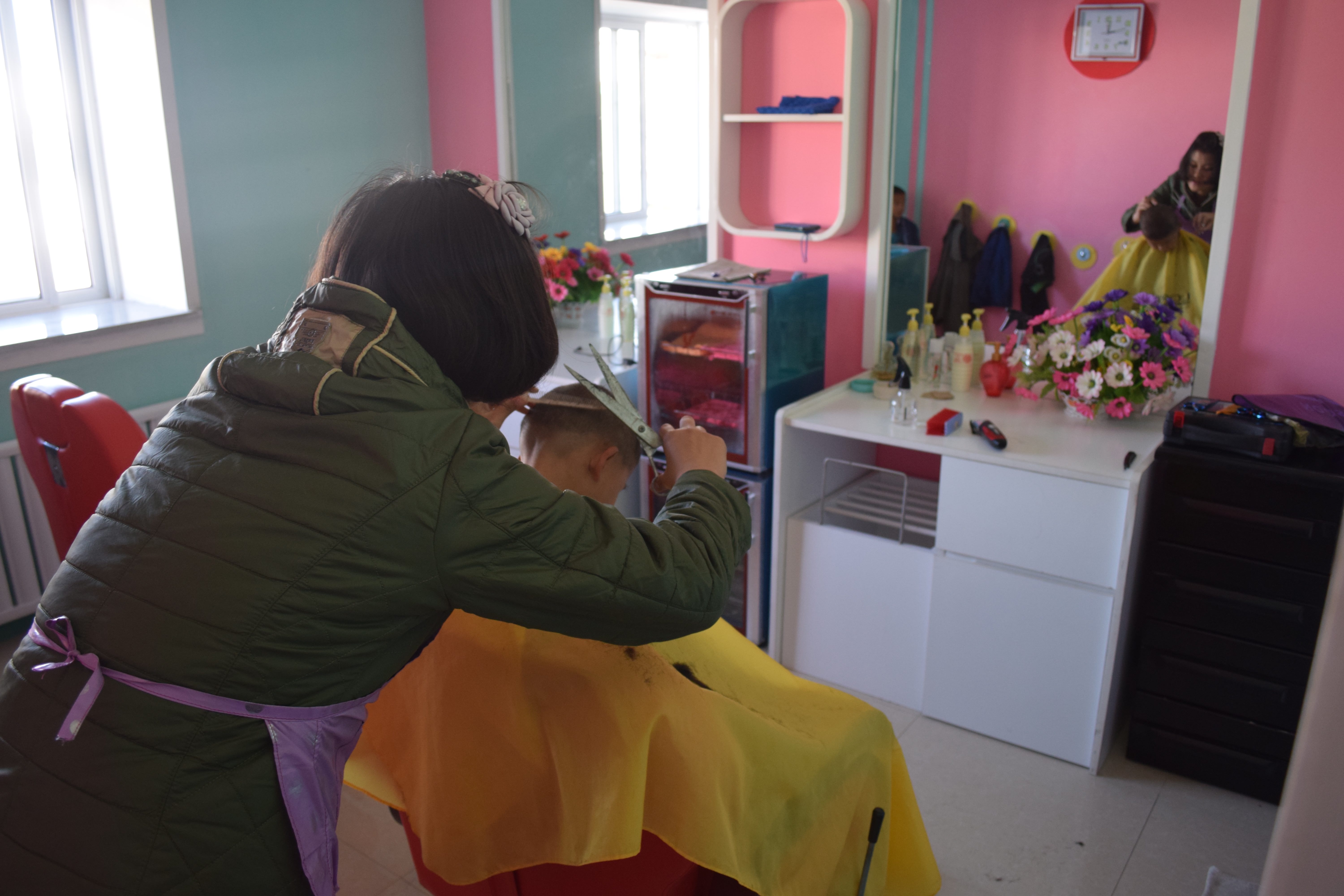 Hairdresser’s at an orphanage near Nampo city