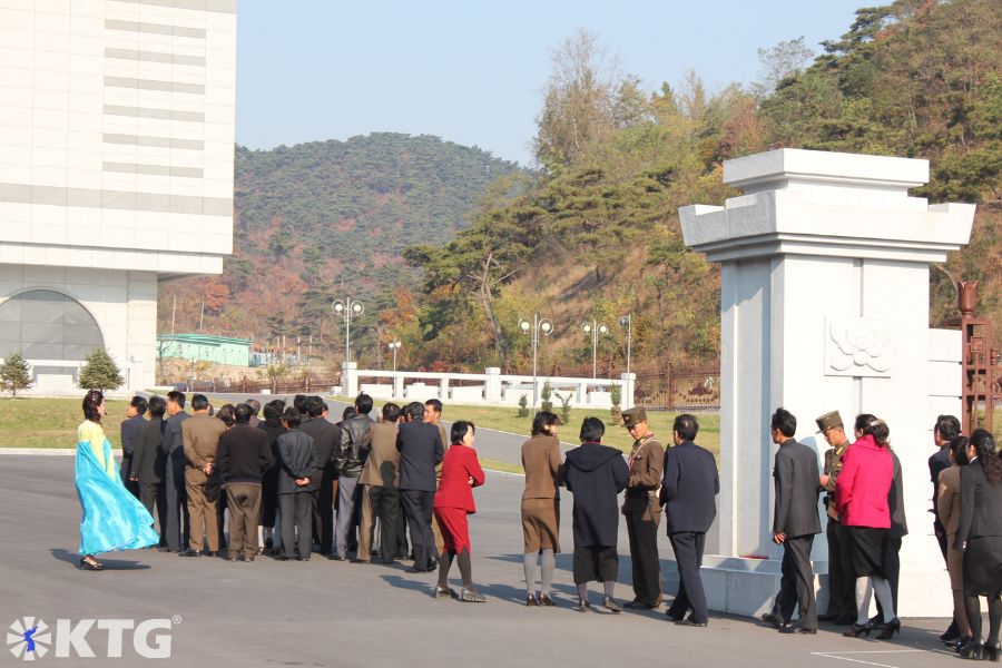 North Koreans lining up at the  National gifts exhibition house near Pyongyang, North Korea, DPRK.