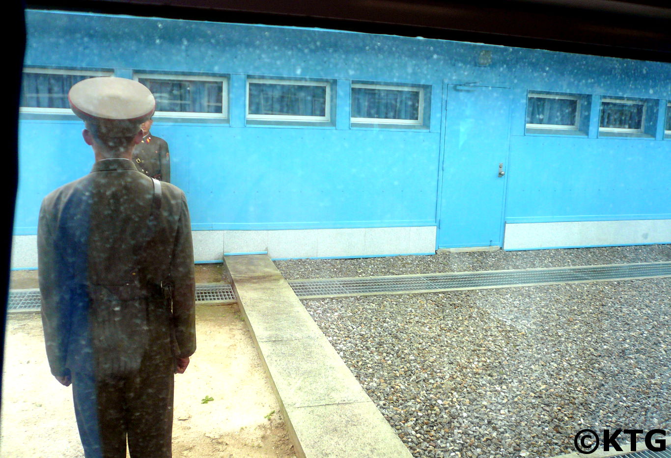 The concrete slab marks the demarcation line in Panmunjom at the DMZ and separates North and South Korea