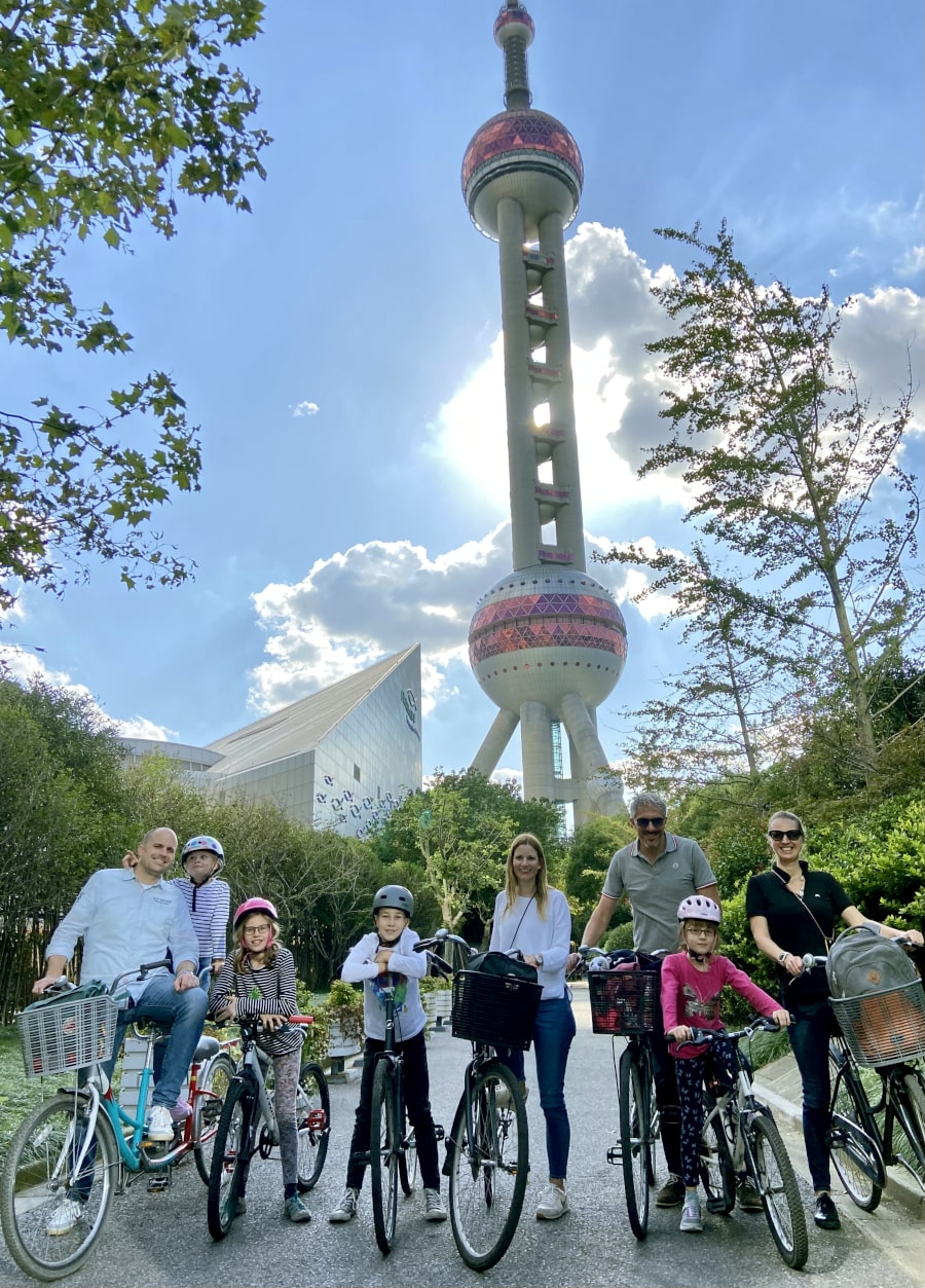 Views of the Oriental Pearl Tower in Shanghai, China, during a bicycle tour along Suzhou Creek ie Wusong river