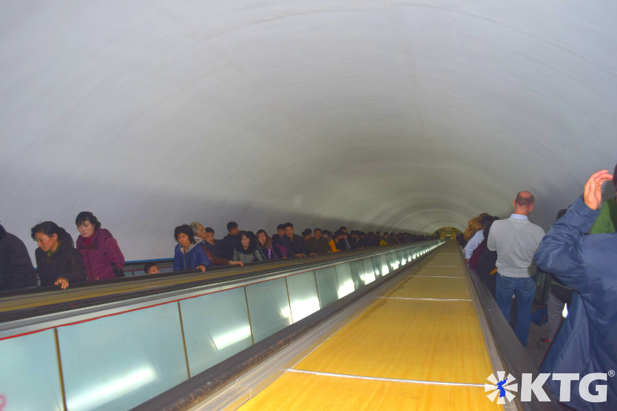 Going deep under. Escalator at the Pyongyang metro in North Korea, DPRK. Picture of North Korea by KTG Tours