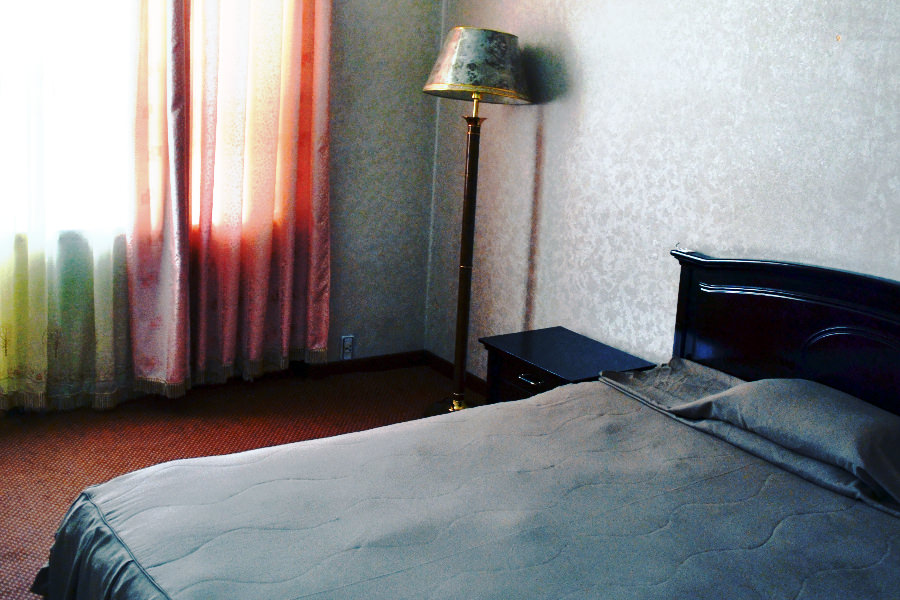 Low budget hotel room in North Korea (DPRK). Picture taken by KTG Tours