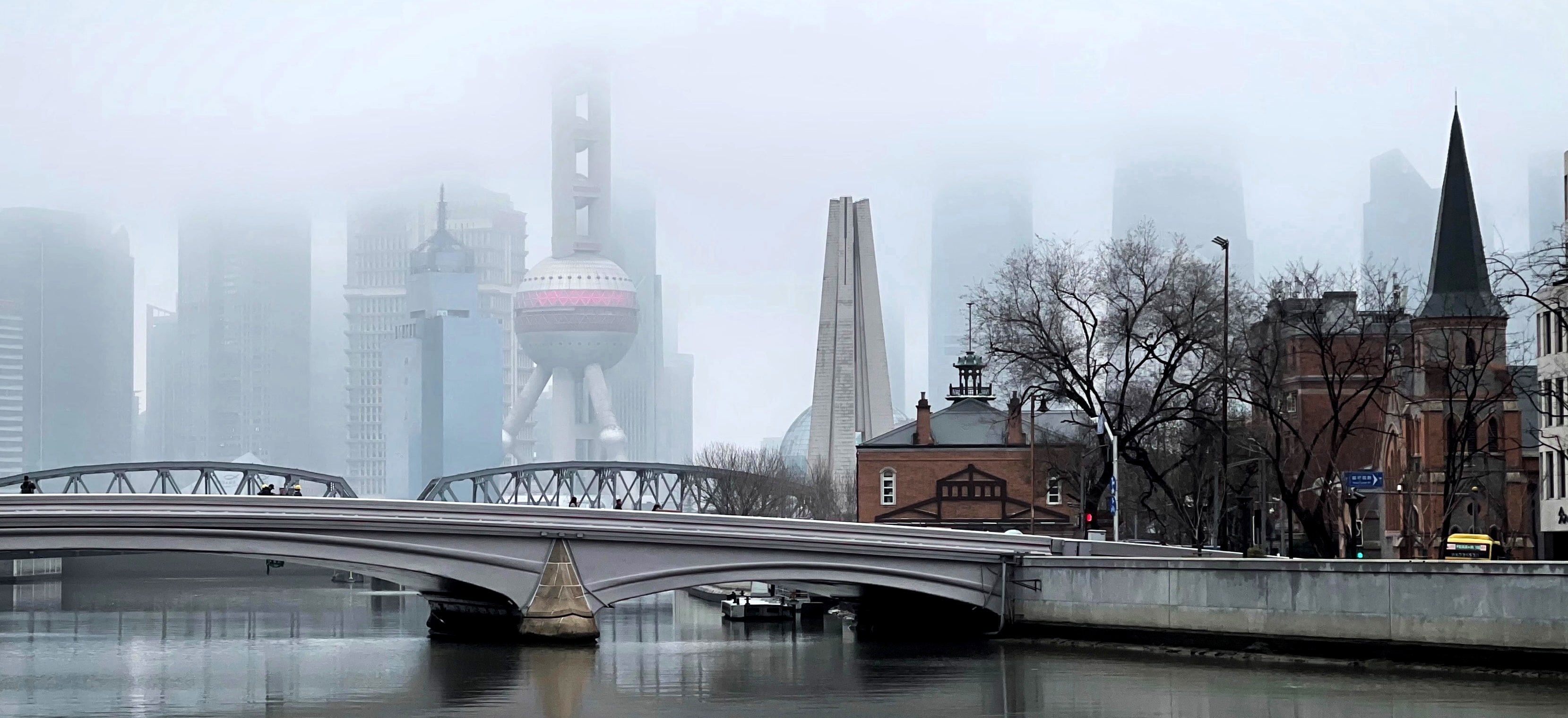 The impressive Shanghai skyscrapers of Lujiazui in Pudong district, Shanghai, China and the Bund