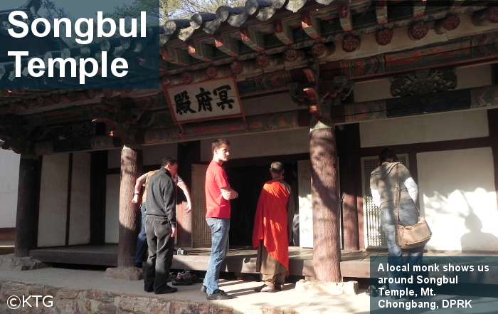 Local monk shows us around Songbul Temple, Mt. Chongbang, Sariwon, North Korea (DPRK)