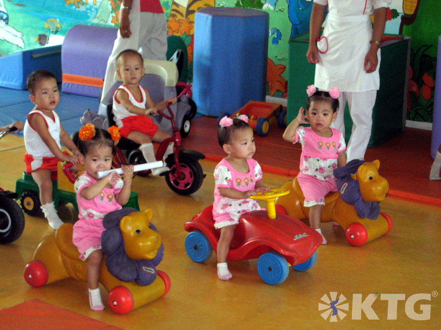 Triplets at an orphanage in North Korea. Trip arranged by KTG Tours