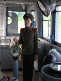 Local North Korean female guide in the USS Pueblo spyship in Pyongyang, North Korea