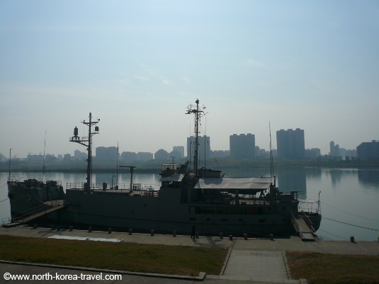 USS Pueblo at its original location by the Taedong River. It has now been moved