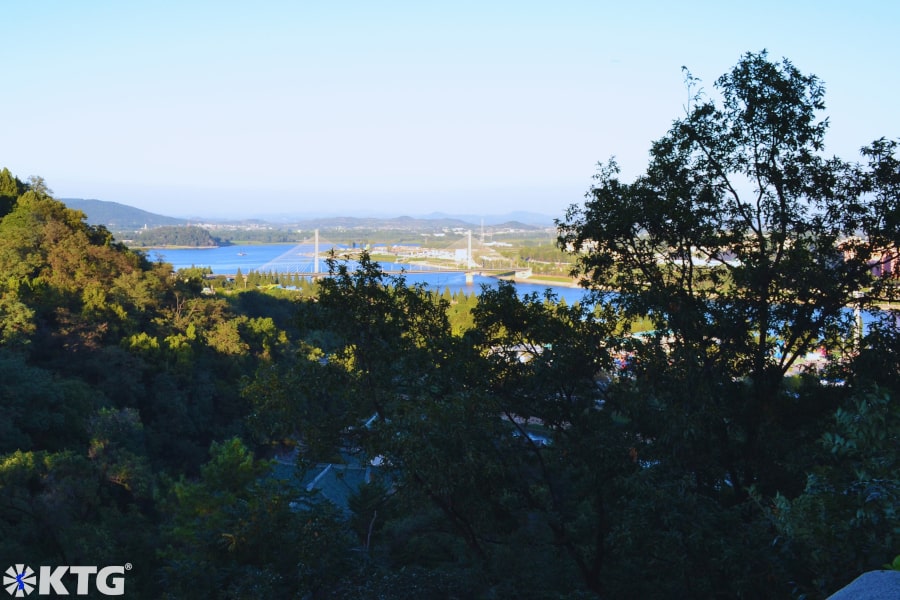 Views of the Taedong river from a pavilion in Moranbong park in the heart of Pyongyang the capital of North Korea. Thousands of locals gather here to celebrate on national holidays. Hundreds come too on Sundays to dance, sing and picnic. Picture taken by KTG Tours