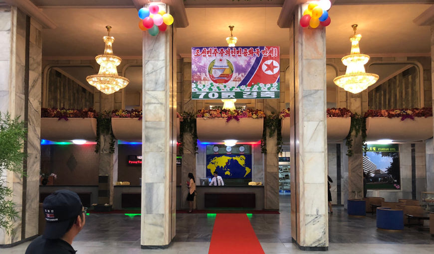 lobby of the Ryanggang Hotel in the sports village of Pyongyang, North Korea (DPRK). The Ryanggang Hotel is a budget hotel in Pyongyang rated as a first class hotel. We took this picture during our 2018 National Day Holiday; the 70th anniversary of the foundation of the DPRK. Trip arranged by KTG Tours