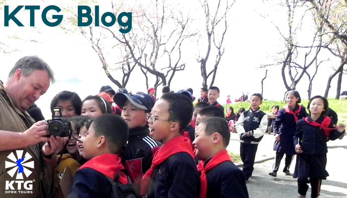 Children in Pyongyang, North Korea with a KTG tourist