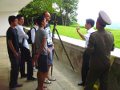 North Korean Colonel explains to KTG travellers where the concrete Wall in South Korea is located. This spot is 27 kilometres east of Kaesong city in the DPRK