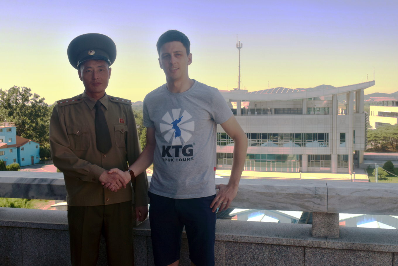 KTG staff member at the DMZ (Panmunjom) with a North Korean soldier, (DPRK)