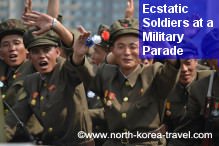 North Korean soldiers greet enthusiastically at a military parade in เปียงยาง (Pyongyang), DPRK