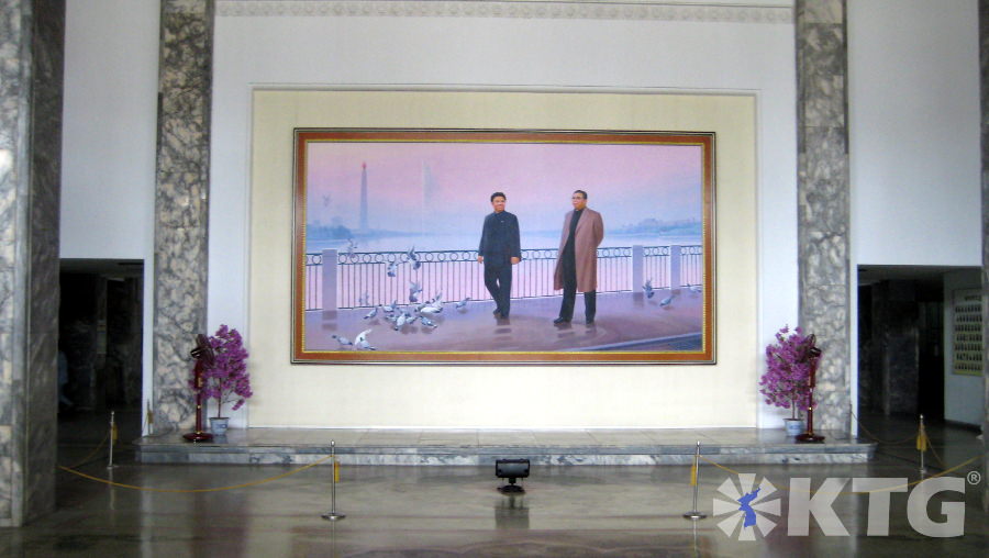 Picture of President Kim Il Sung and Chairman Kim Jong Il at the Entrance of the Pyongyang Maternity Hospital in North Korea. Trip arranged by KTG Tours