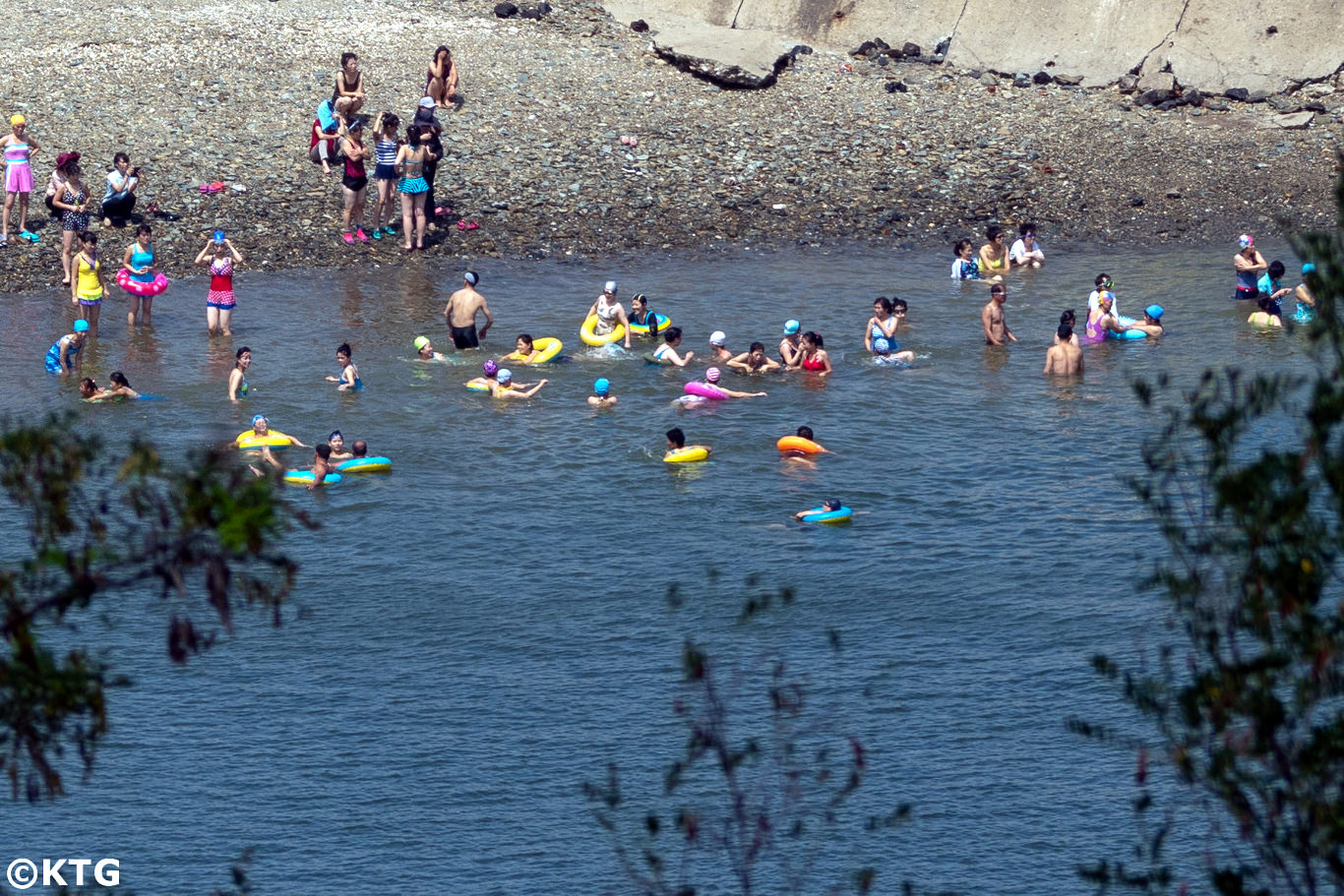 North Koreans swimming at the sea and enjoying a day at the beach in Nampo, North Korea (DPRK).