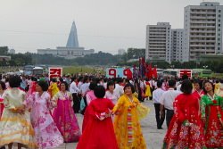 Mass dances on National Day in Pyongyang, North Korea, DPRK. Tour arranged by KTG