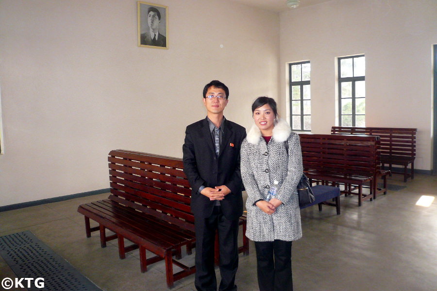 North Korean guides at the Wonsan Train Station Revolutionary site in North Korea, DPRK, with KTG Tours