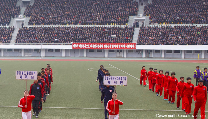 North Korean athletes line up in Kim Il Sung Stadium preparing for the Mangyongdae Prize Marathon aka The Pyongyang Marathon
