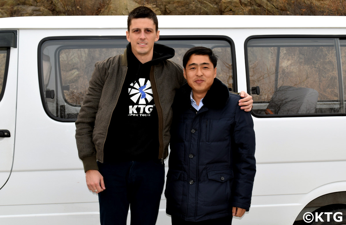 KTG staff member in the special economic zone of Rason in North Korea (DPRK) with local North Korea guide and partner Mr. Kim