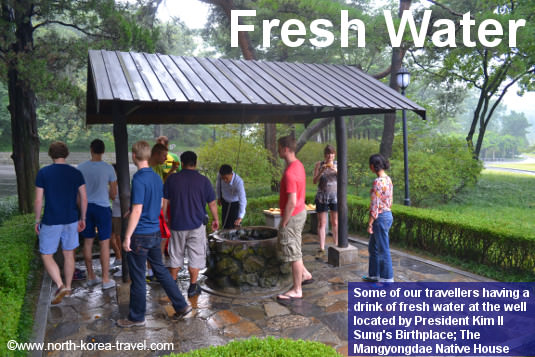 Drinking water at the well located in the Mangyongdae Native House in Pyongyang. This is the birthplace of President Kim Il Sung