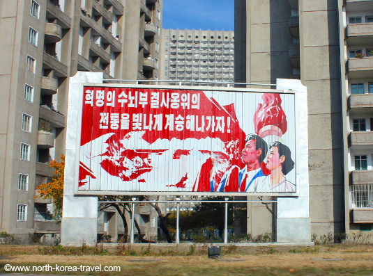 Propaganda banner in North Korea with Mt. Paekdu in the background