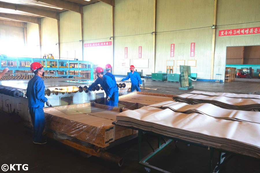 North Korean factory workers at the Tae'an glass manufacturing factory in Nampo, the friendship factory. Picture taken by KTG Tours