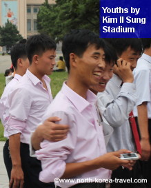 https://www.north-korea-travel.com/north-korea-china-national-day-tour.html North Korean youths by Kim Il Sung Square in Pyongyang, DPRK