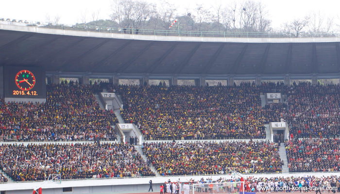 North Koreans cheering at runners in the Pyongyang Marathon (Mangyongdae Prize Marathon) in 2015