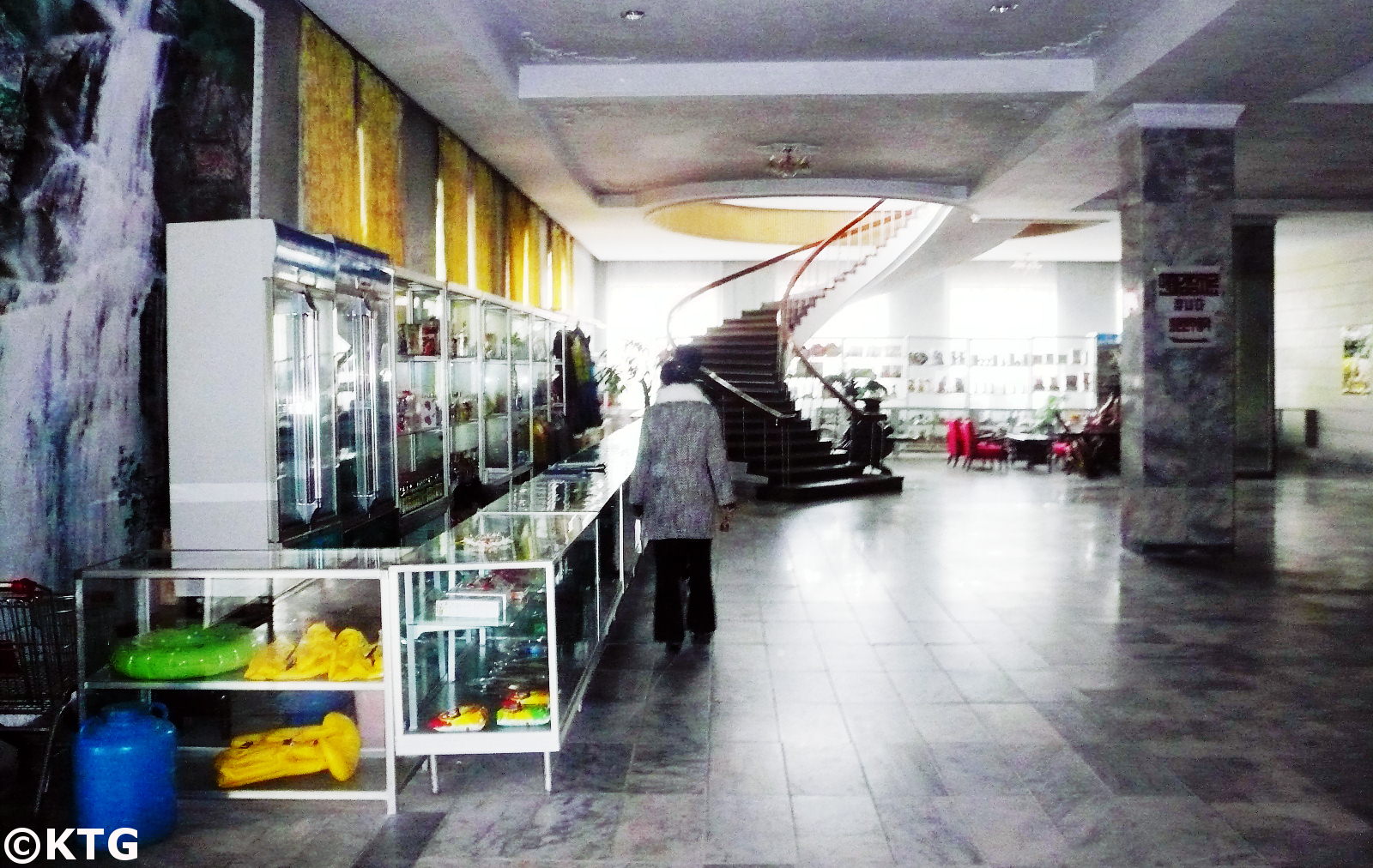 North Korean lady at the souvenir shop at the Songdowon Hotel in Wonsan city, Kangwon province, North Korea (DPRK). Trip arranged by KTG Tours