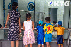 family at Pyongyang zoo in North Korea