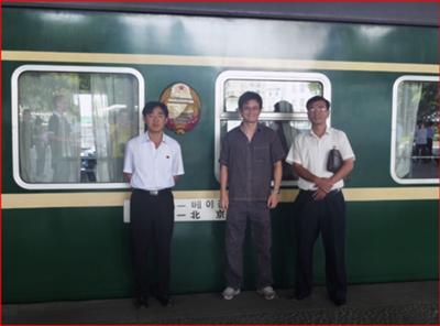 Me with our two guides in front of the train bount for Beijing.